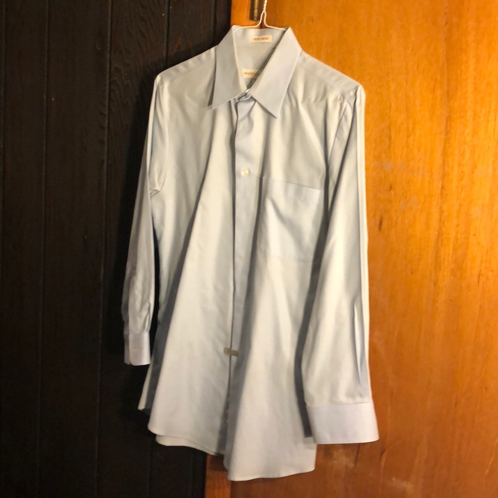 Blue button down dress shirt non-iron 100% cotton.  signs of wears around collar
